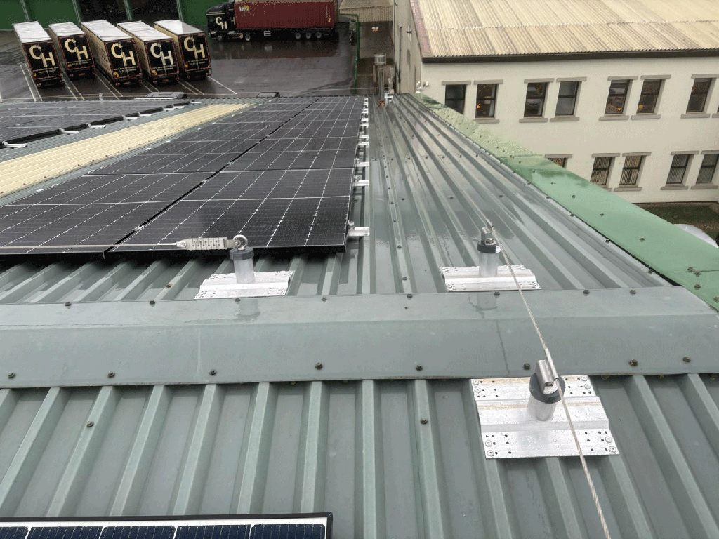 Lifelines for safe solar maintenance on industrial roofs