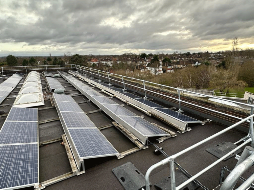 guardrails installed on a roof around solar panels
