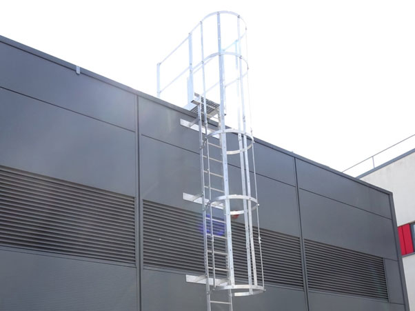Bespoke fixed access ladder for safe access to a roof