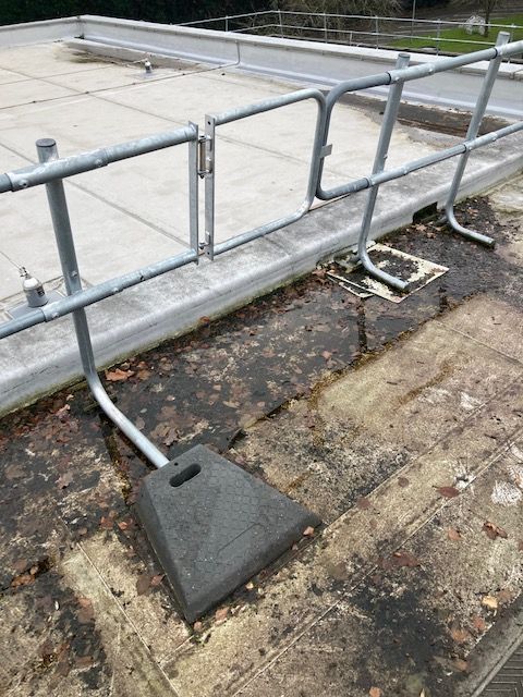 Failed rooftop guardrail