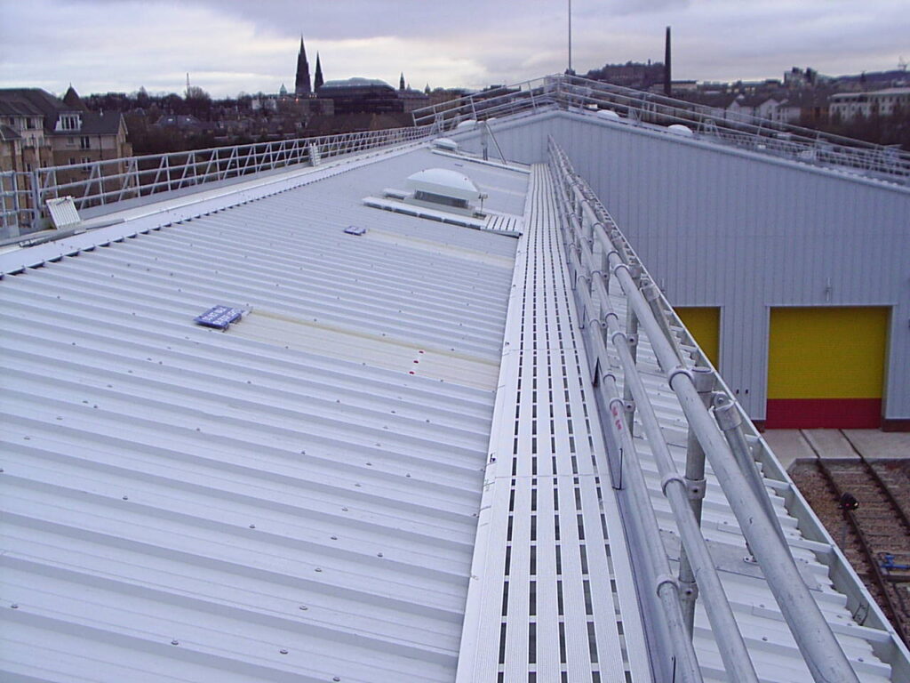 Rooftop walkway on an industrial roof with edge protection